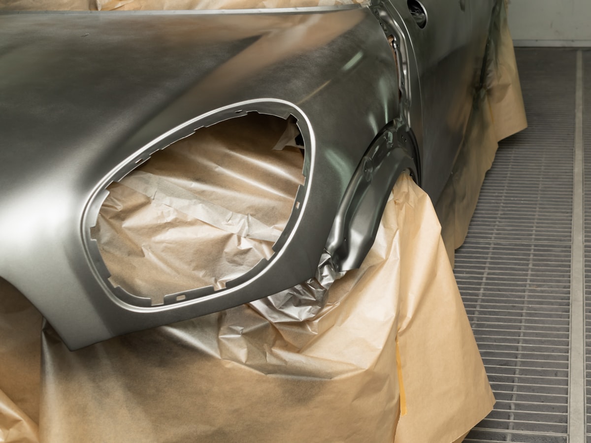Masked panel prepared for dent repair